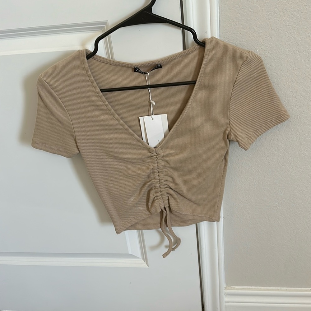 Tan cropped top with tie in front from Zara !!